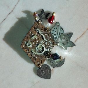 1980's "Far-Fetched" Sterling charm and copper pin